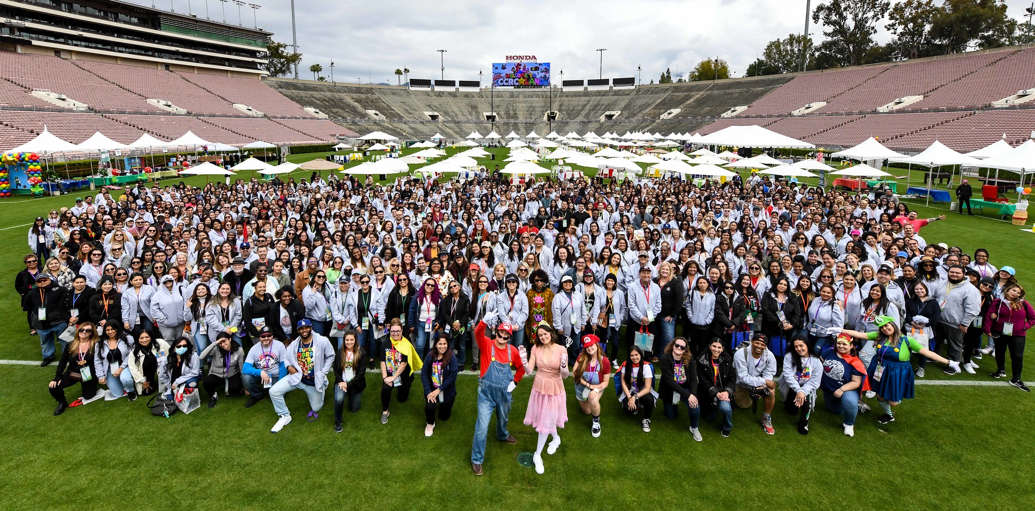 2023 All staff group photo at Pasadena Rose Bowl Stadium 