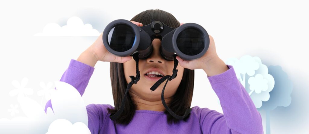 Child looking through binoculars