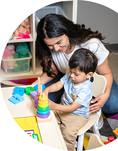 Parent and child playing with shapes